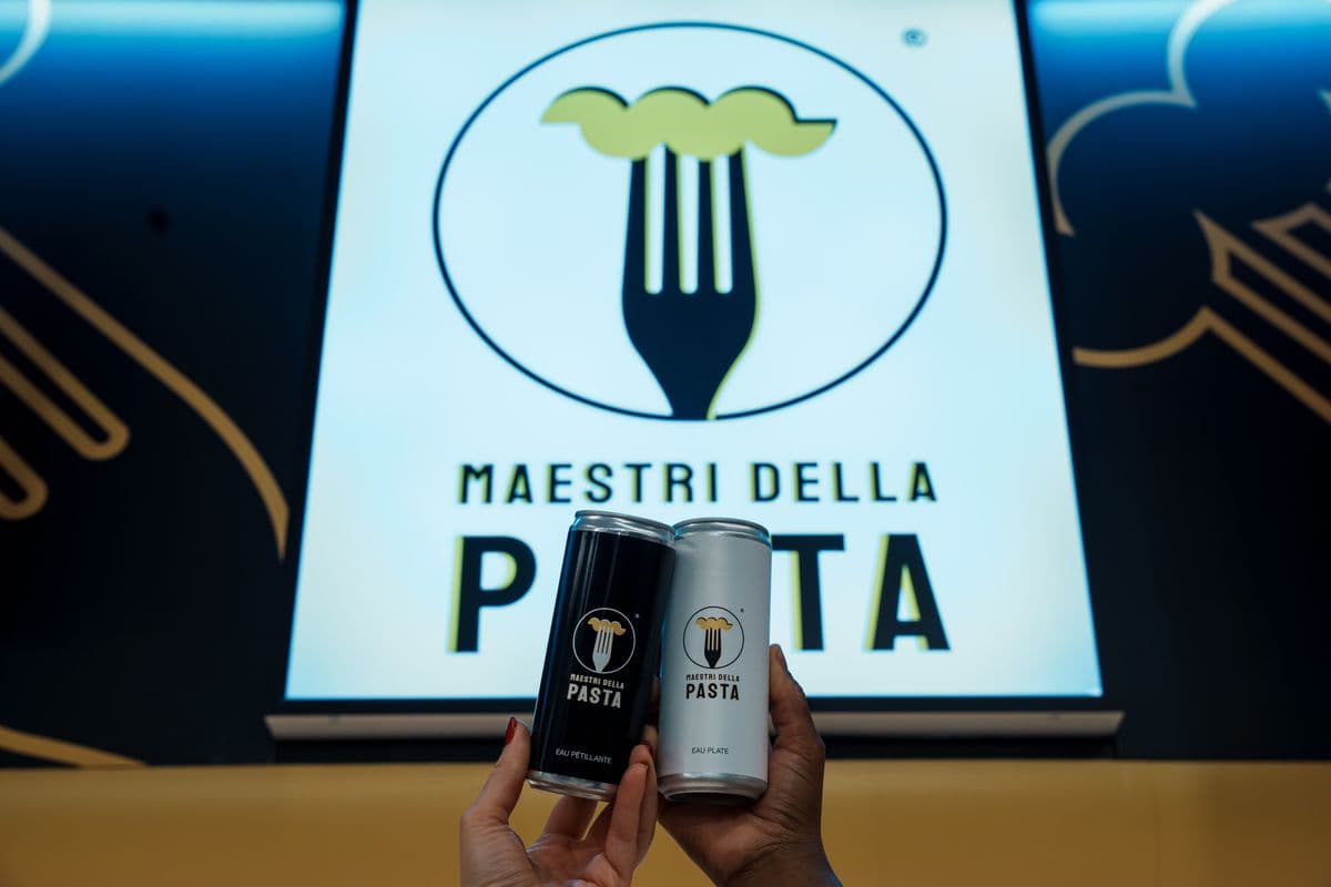 Fresh Italian pasta being plated at Maestri della Pasta